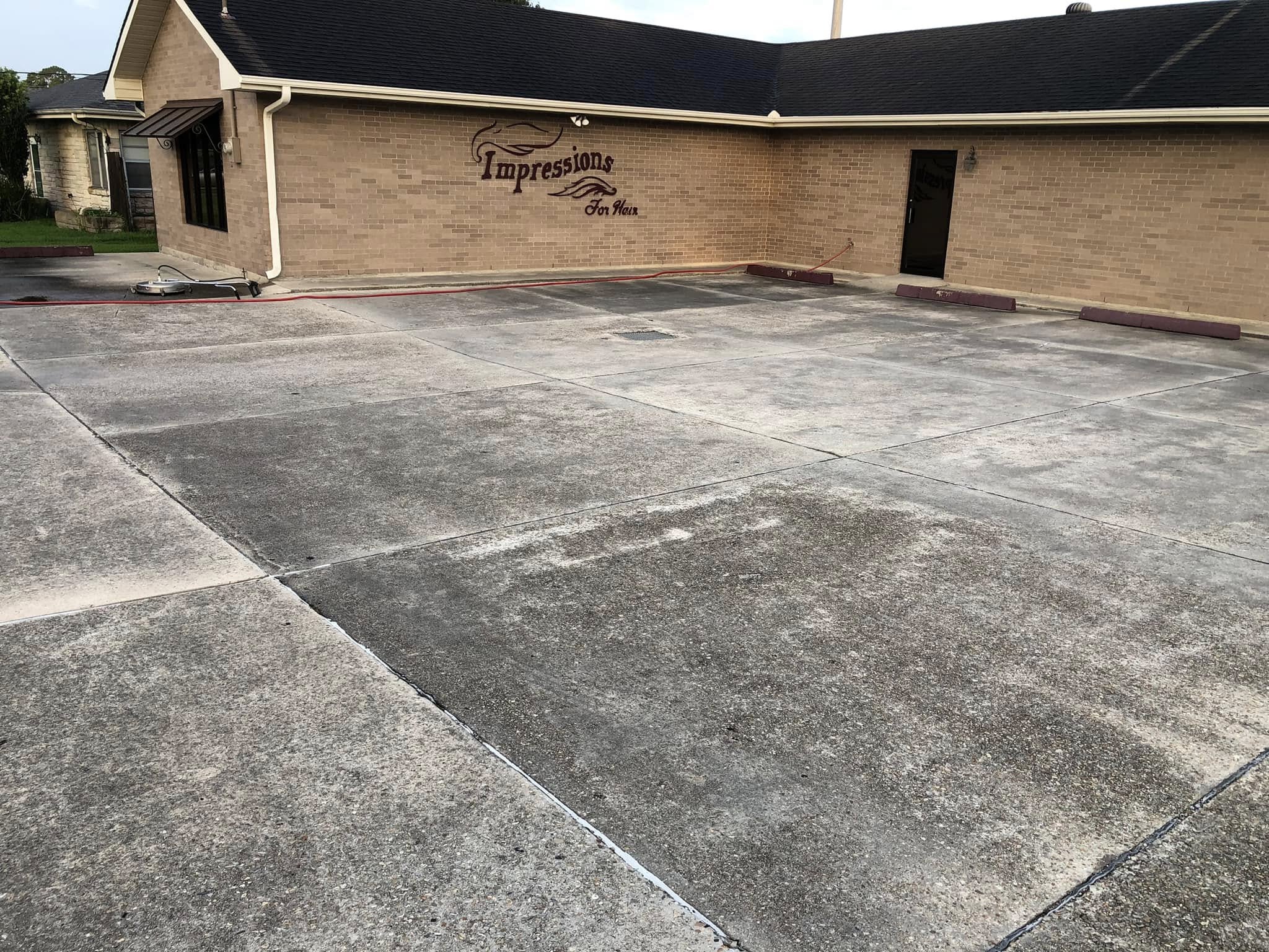 Commercial lot concrete before cleaning
