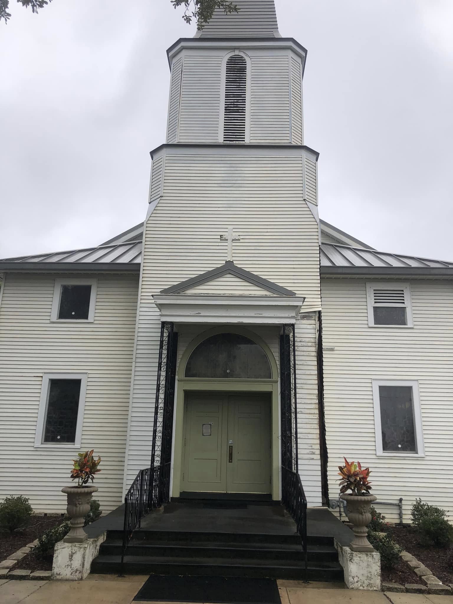 Church exterior after a full soft wash — bright white siding
